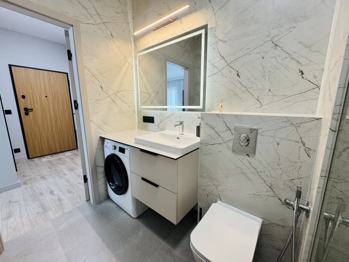 Cicha nowoczesna kawalerka w Mokotowie – 11